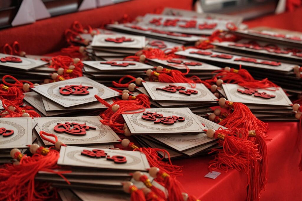 pexels-photo-3626475 Red and gold traditional decorations for Chinese New Year celebrations.